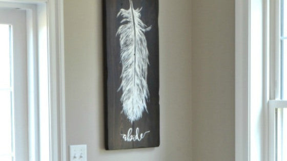 Feather painting on reclaimed wood